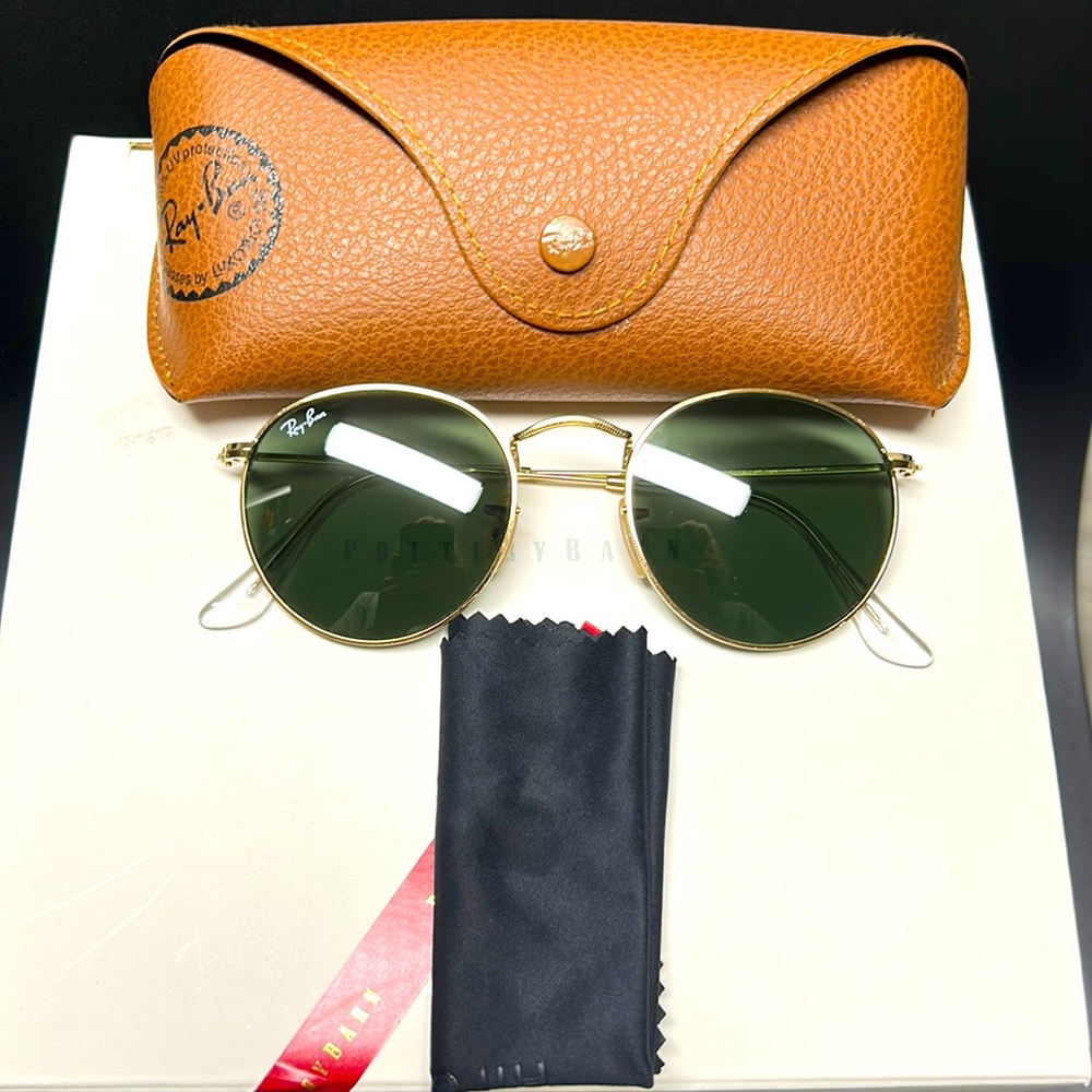 Ray-Bans sunglasses polished gold frame with round green lenses